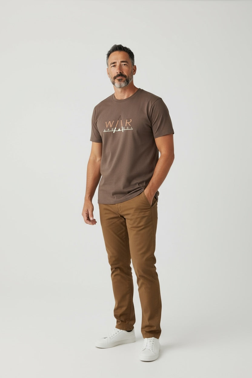 Man wearing a brown t-shirt with 'WAR APPAREL' logo
 and brown pants on a white background